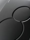 Geberit Sigma01 round plaque de déclenchement, noir foncé, deux boutons, design élégant.