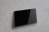 Geberit Sigma70 plaque de déclenchement, verre brillant noir, déclencheur frontal, design élégant.