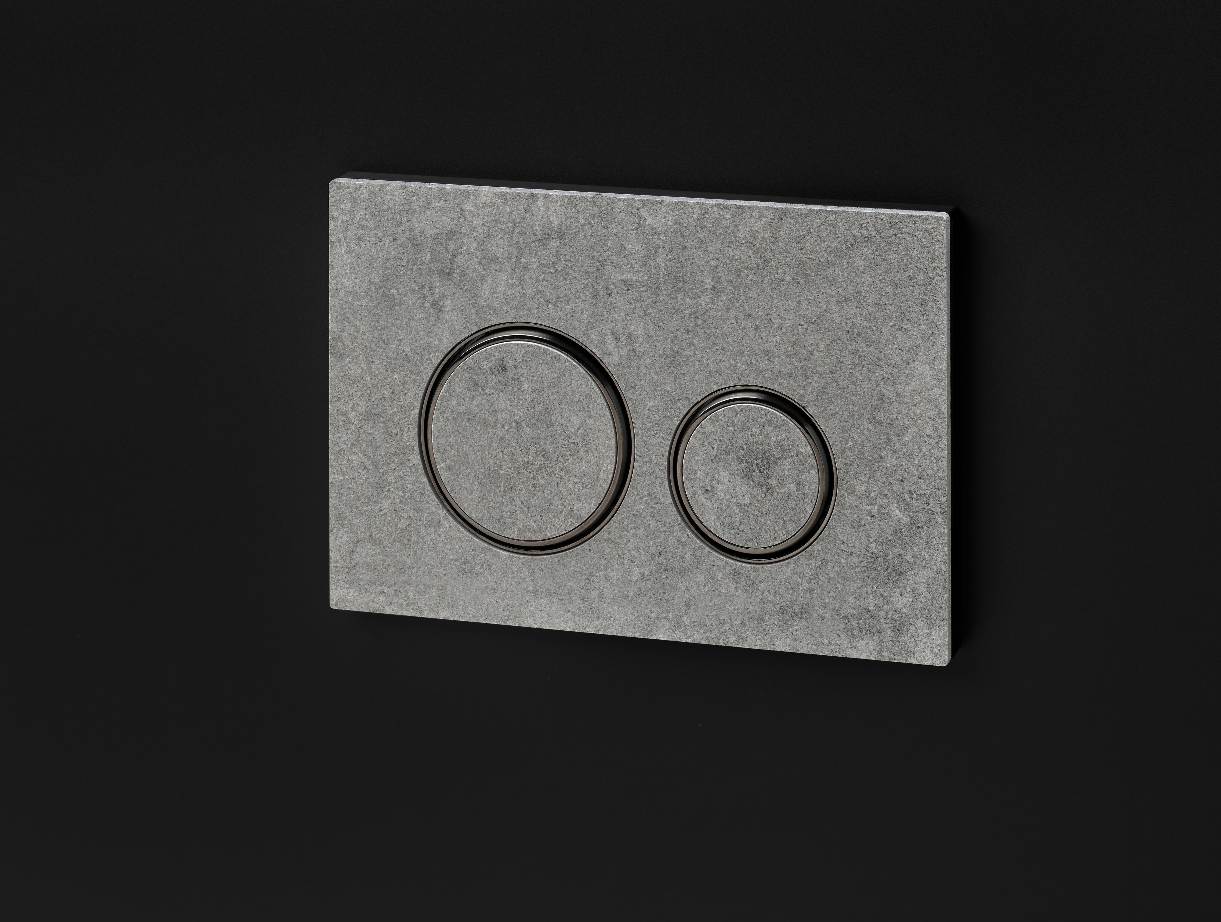 Plaque de déclenchement Geberit Sigma50 round / Aspect béton - anneaux design : noir chromé brossé / Revêtement Easy Clean + Anti-Traces de doigt