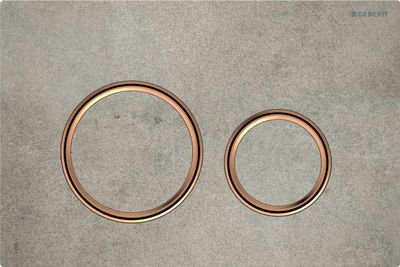 Geberit Sigma50 round flush plate / Concrete and red gold finish
