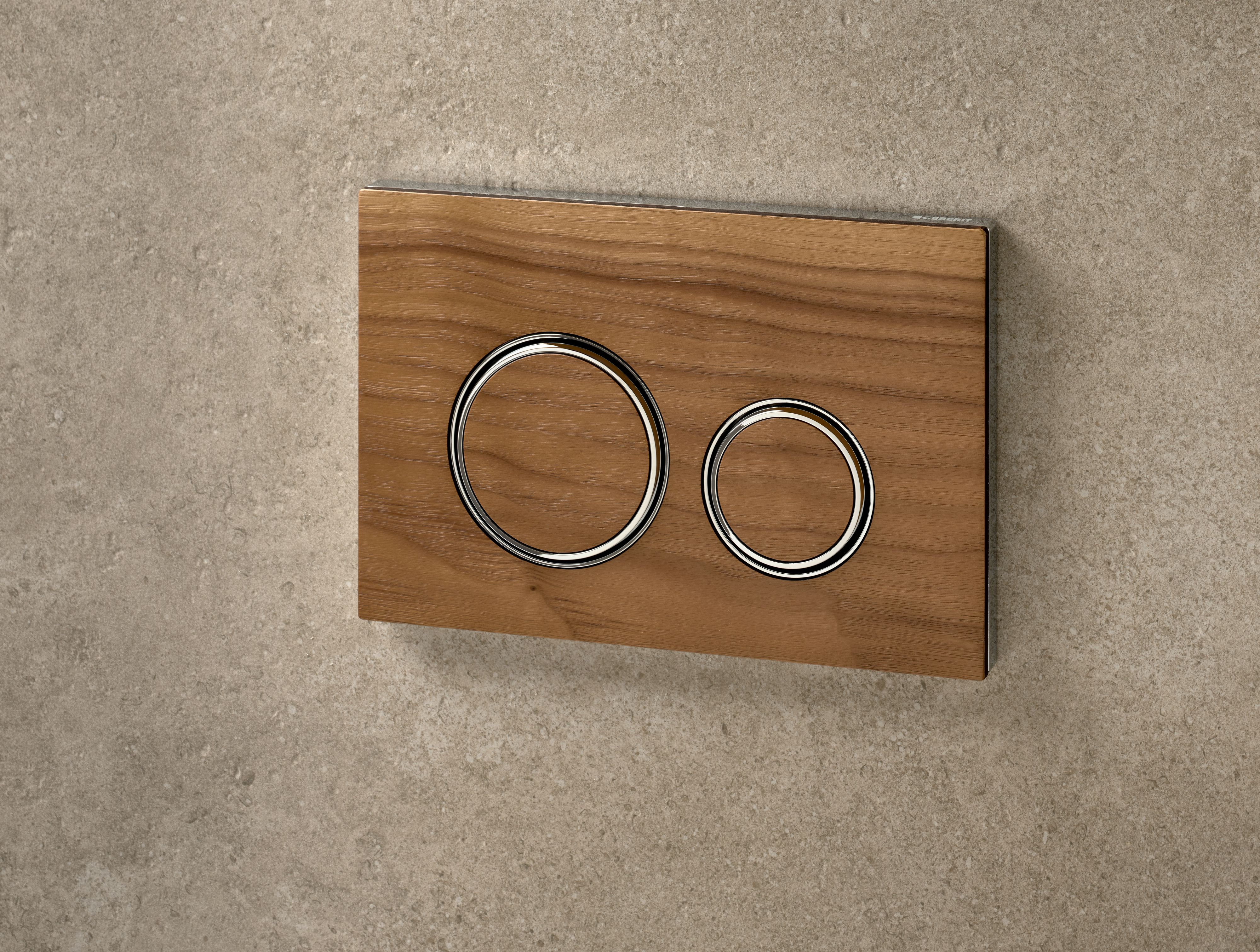 Plaque de déclenchement Geberit Sigma50 round / Noyer américain - anneaux design : or rouge brossé / Revêtement Easy Clean + Anti-Traces de doigt
