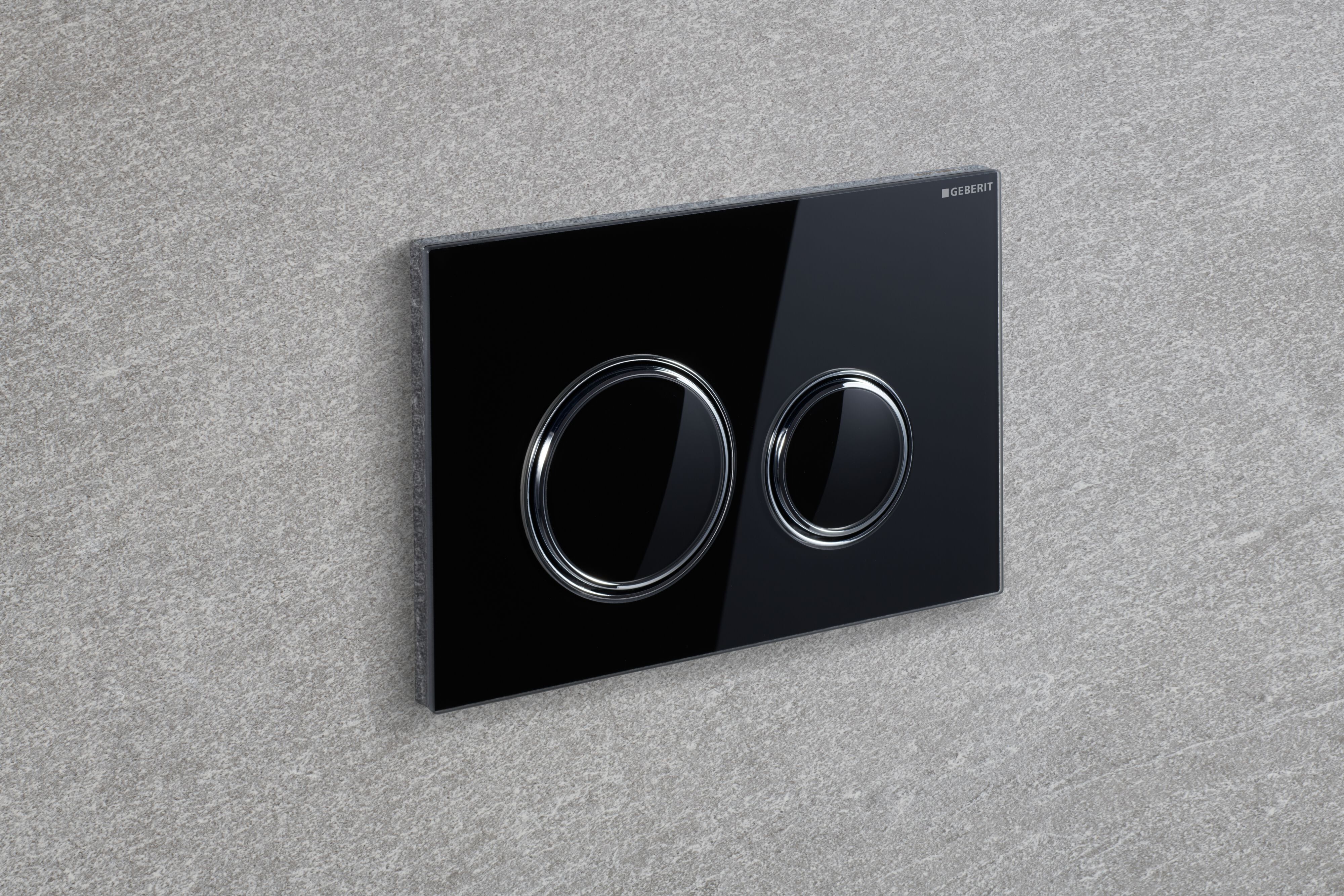 Plaque de déclenchement Geberit Sigma50 round / Verre brillant noir - anneaux design : chromé brillant