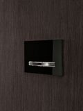 Plaque de commande Geberit Sigma50, noir brillant avec boutons en chrome brossé et finition Easy Clean.