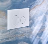 Geberit Sigma40 plaque de déclenchement verre brillant blanc deux boutons.