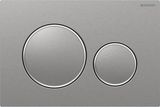 Plaque de commande Geberit Sigma20 en chrome brossé avec anneaux de design polis et boutons de double commande antivandale.