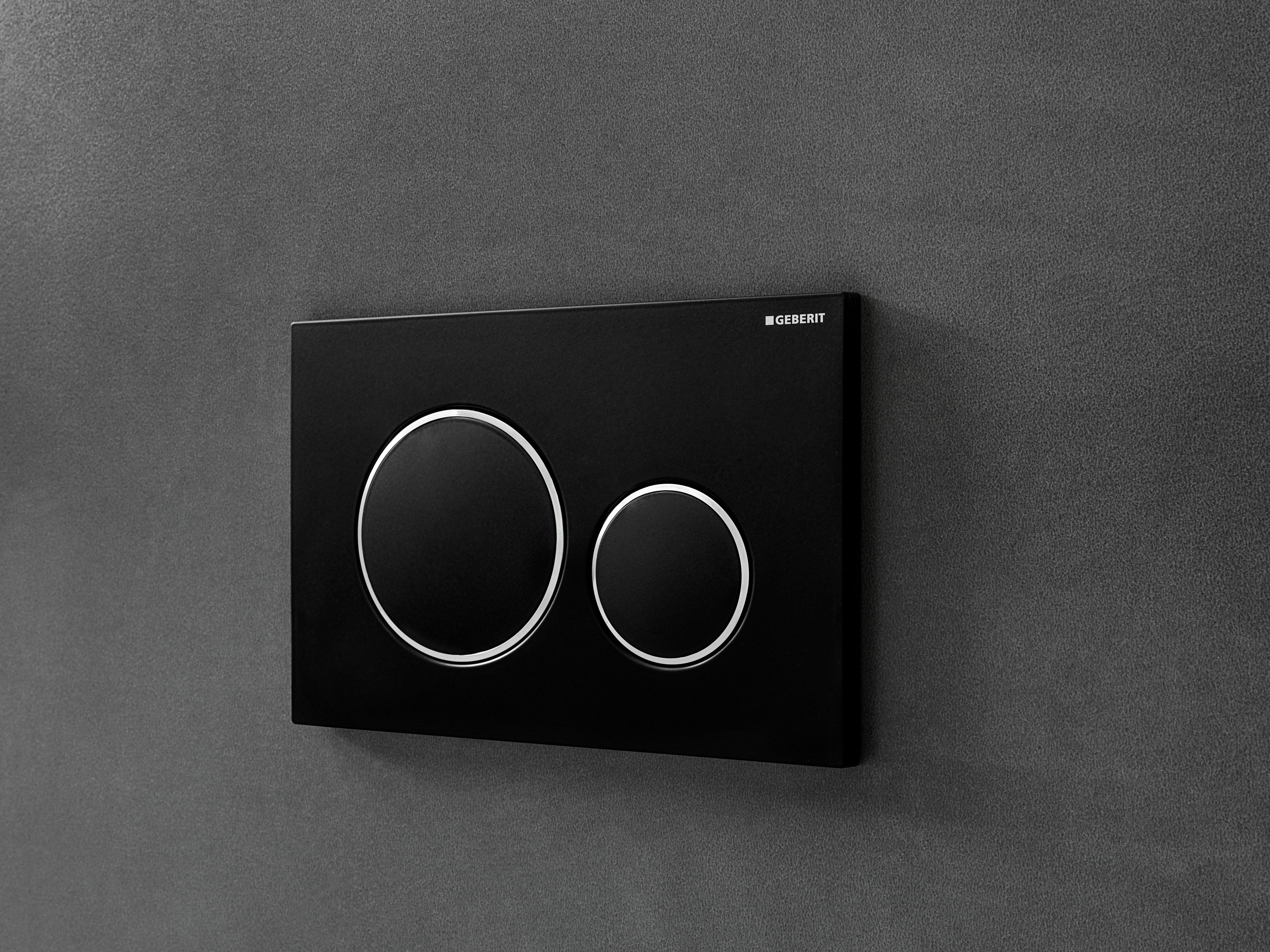Plaque de déclenchement Geberit Sigma20 / Noir mat laqué - anneaux design : chromé brillant / Revêtement Easy Clean + Anti-Traces de doigt