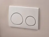 Plaque de commande double chasse d'eau ronde blanche Geberit Alpha25, fixation murale, matériau synthétique, design à deux boutons.