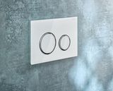 Geberit Sigma50 plaque de déclenchement, verre brillant blanc, anneaux chromés brillants, design rond.