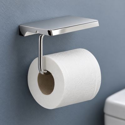 Wall-mounted roll holder with support surface Wall-mounted roll holder with support surface