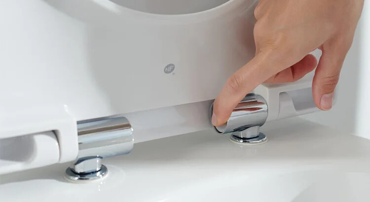 Pack de charnières déclipsables Geberit pour abattant à abaissement automatique pour WC, fixation par le haut