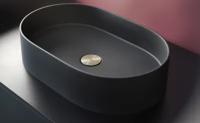 Oval countertop washbasin Deante Silia 55 x 35 cm in matte black