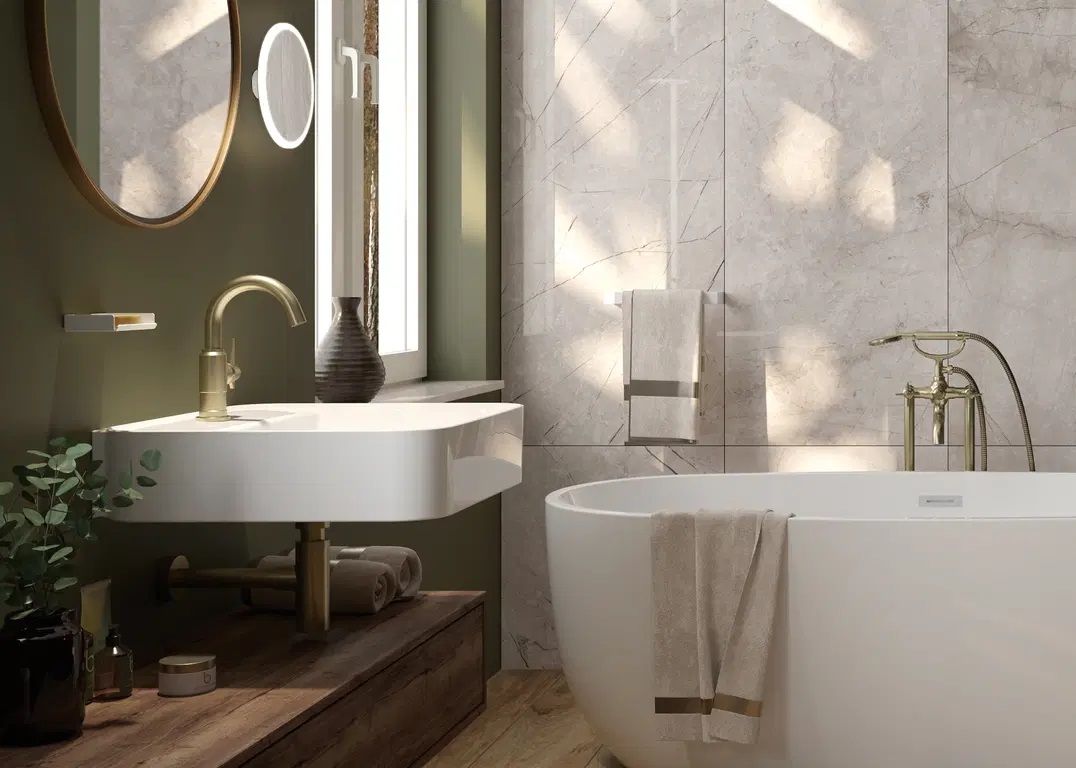 Siphon de lavabo Deante rond en PVD laiton brossé