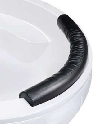 Appui-tête de bain ergonomique noir, en polyuréthane, sur rebord de baignoire blanc, conçu pour soutenir la tête et la nuque.