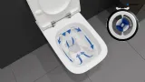 Toilettes Geberit Duofix Sigma avec flèches bleues indiquant le sens d'écoulement de l'eau, céramique blanche, châssis de 12 cm.