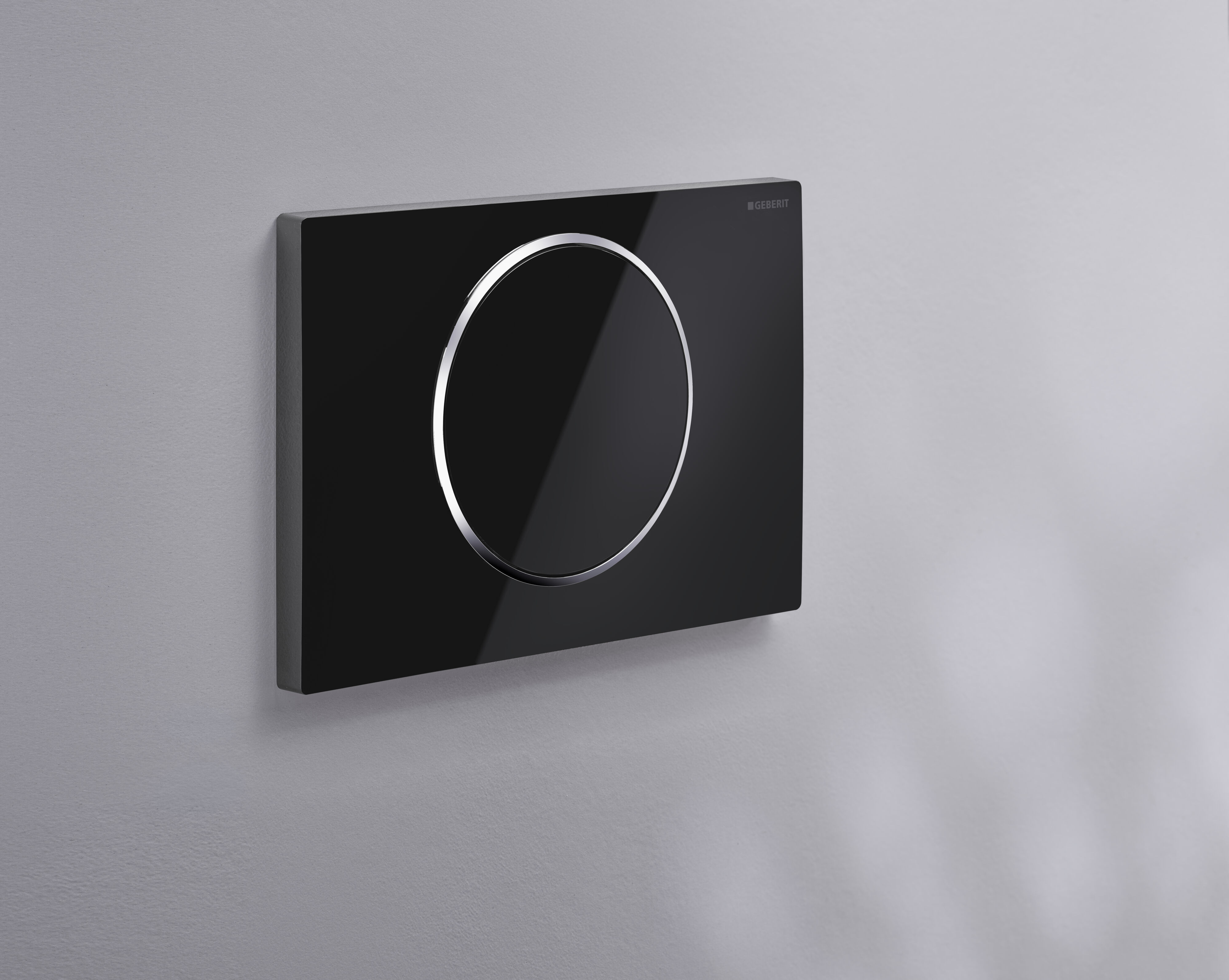 Plaque de déclenchement Geberit Sigma10 / Noir - anneau design : chromé brillant