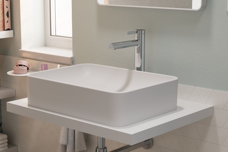 Mitigeur de lavabo Hansgrohe Zesis S 230 CoolStart avec tirette et vidage en chromé — vue 3