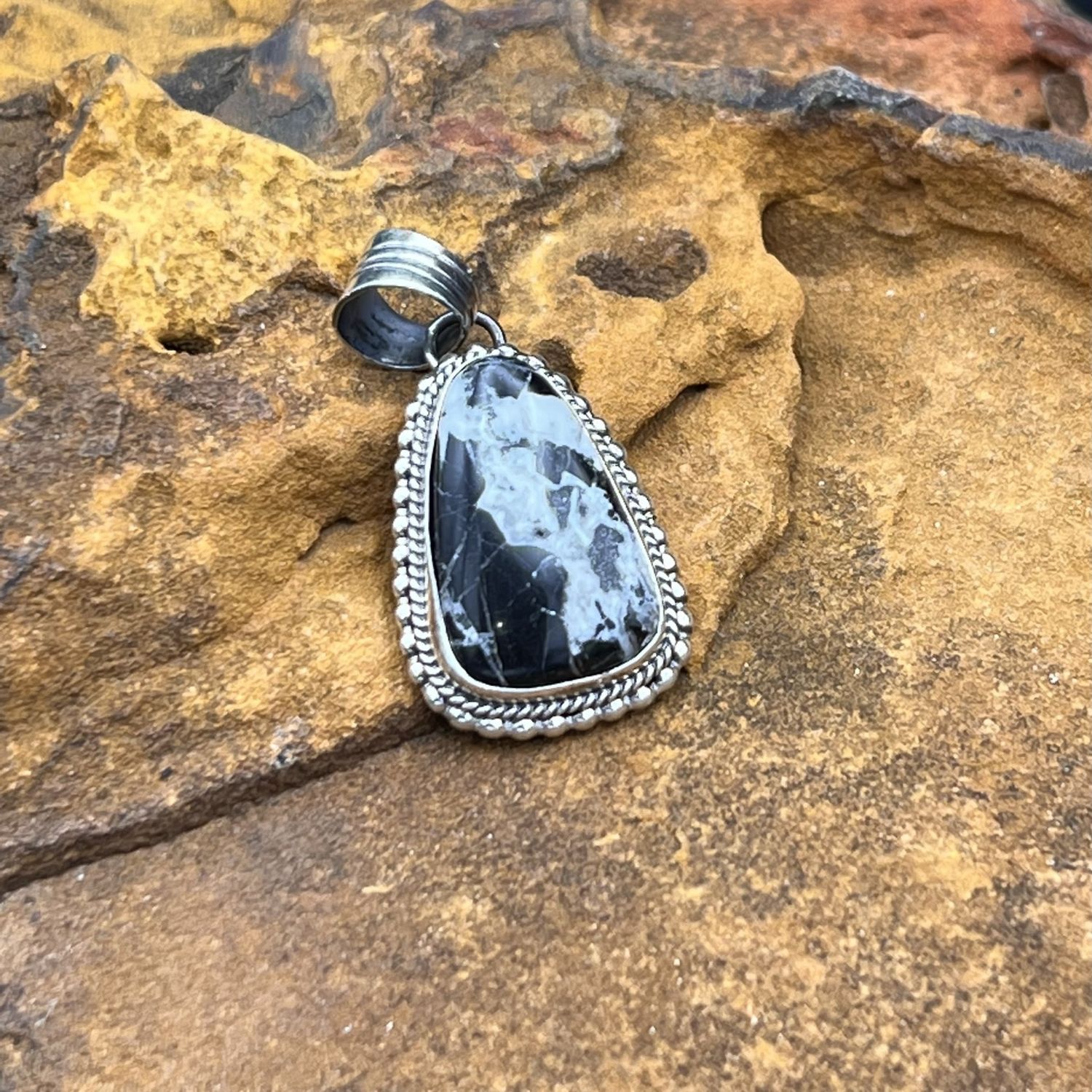 WHITE BUFFALO PENDANT