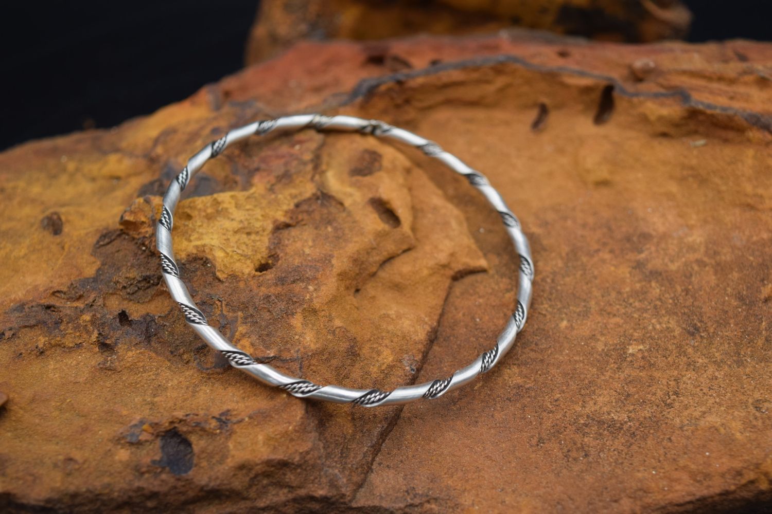 SILVER TWIST BANGLE BRACELET