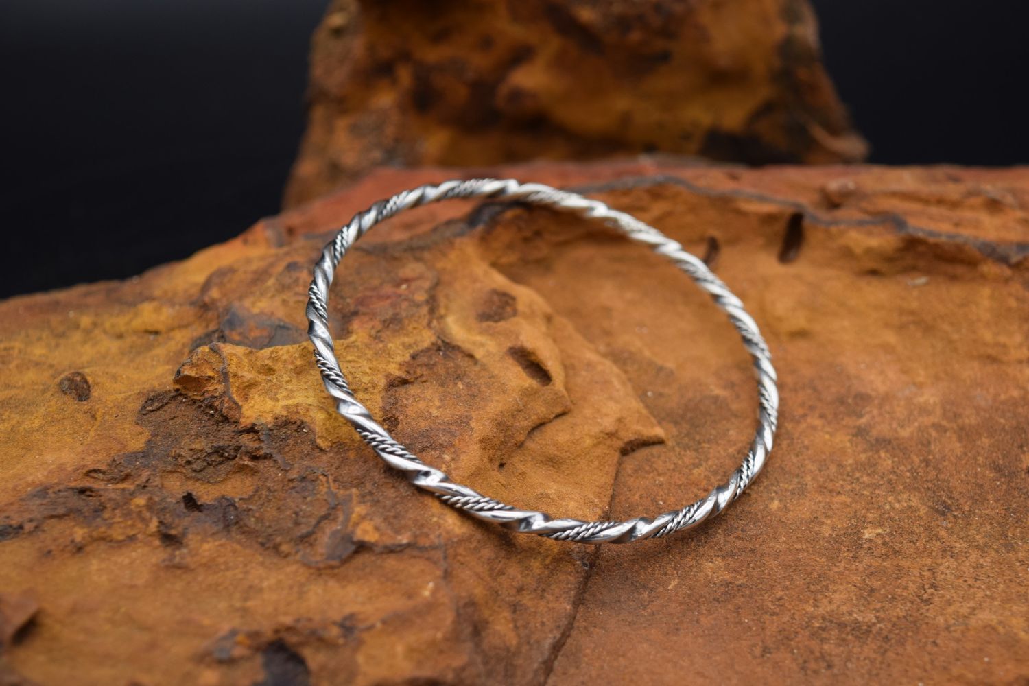 SILVER BRAIDED TWIST BANGLE BRACELET