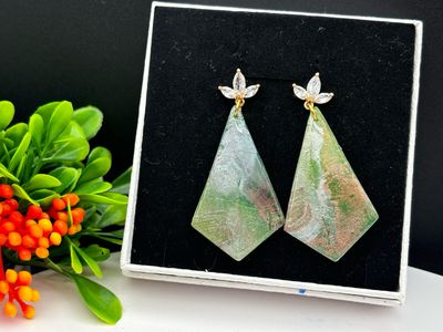 Enchanting Statement Colouring Changing Studs