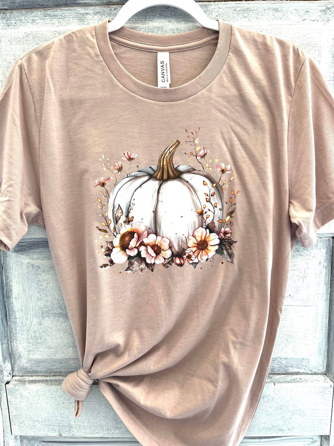 Pastel cream colored pumpkin with floral