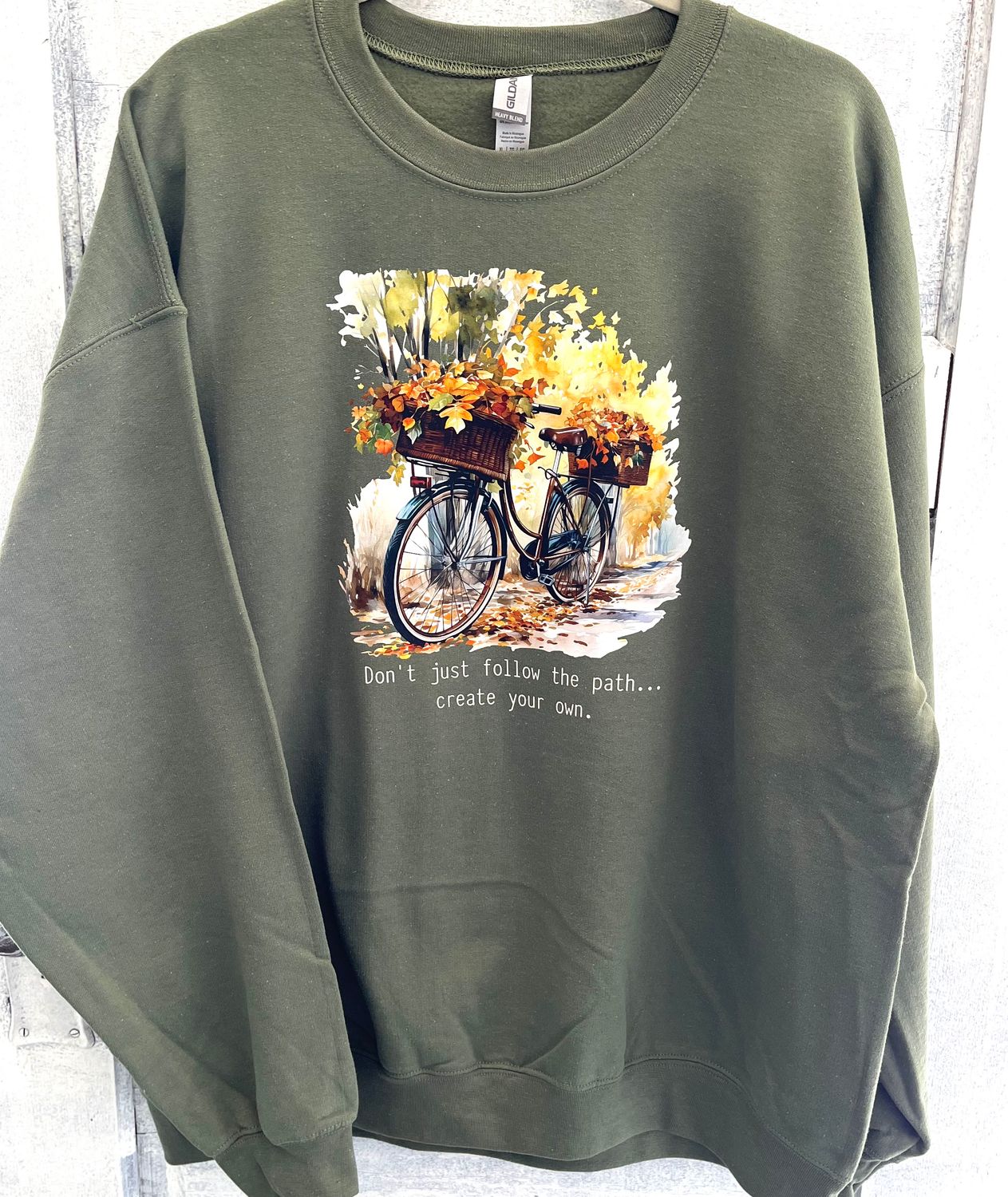 Fall Bicycle… Don’t just follow the path, create your own.  Gildan unisex sweatshirt - Military Green