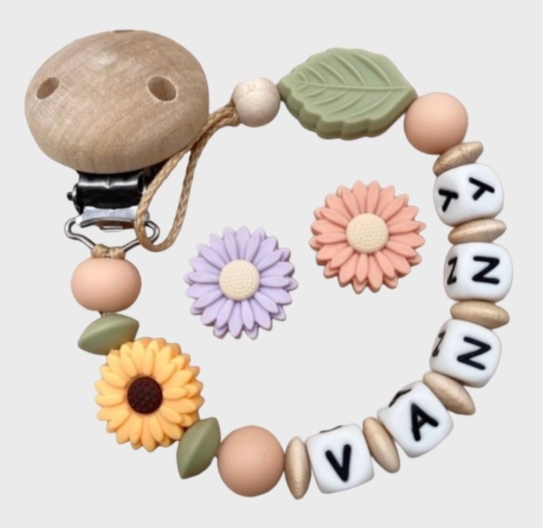 Nuggikette aus Holz und Silikon mit Blumenmotiv