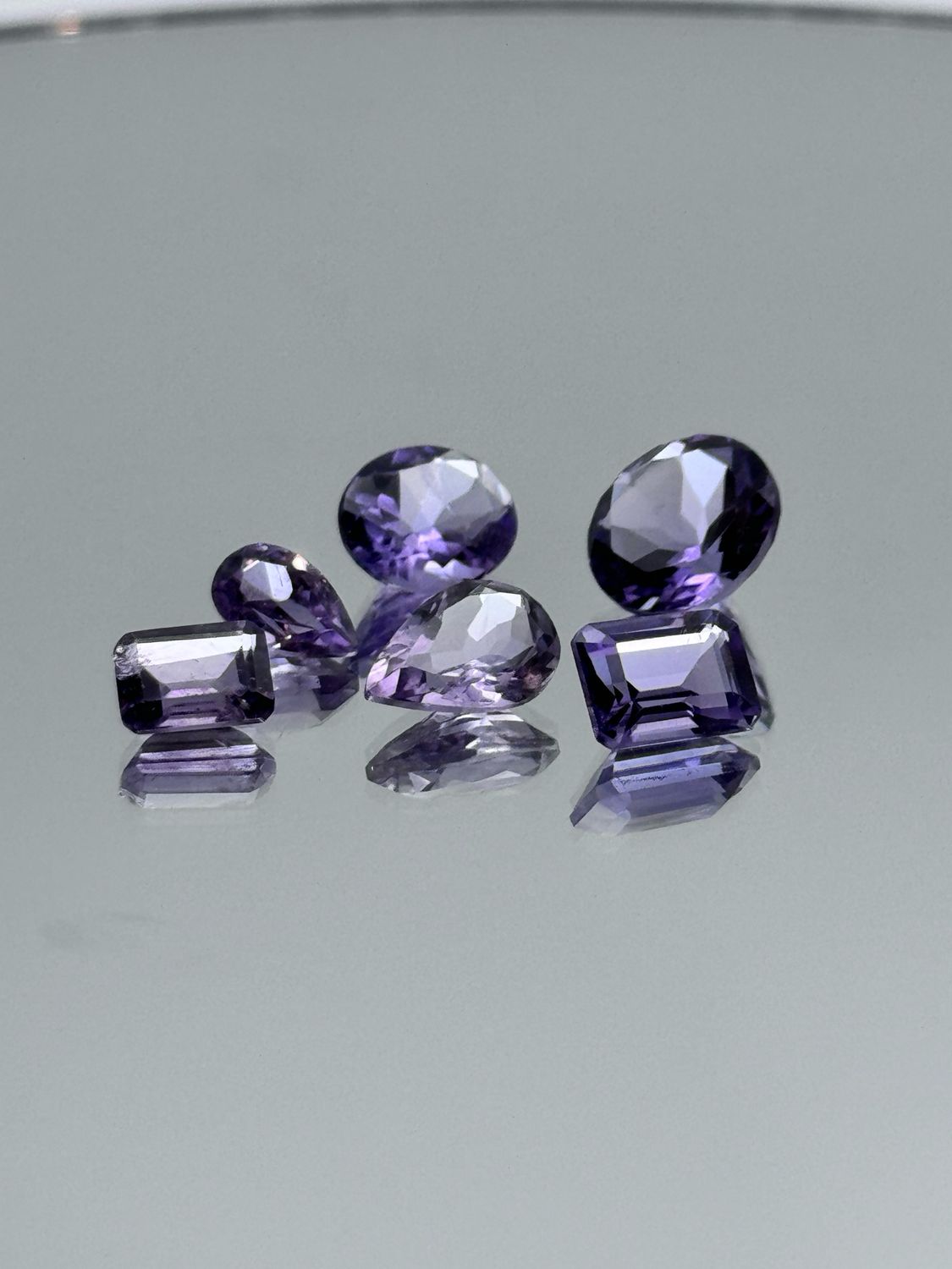 Natural Faceted Amethyst, Mixed Lot, Minimum 10 Carat Total Weight, Mixed Shapes &amp; Sizes, Minimum 8 Stones Per Parcel, Stones Clean To Slightly Included. No Two Parcels Are Exactly The Same