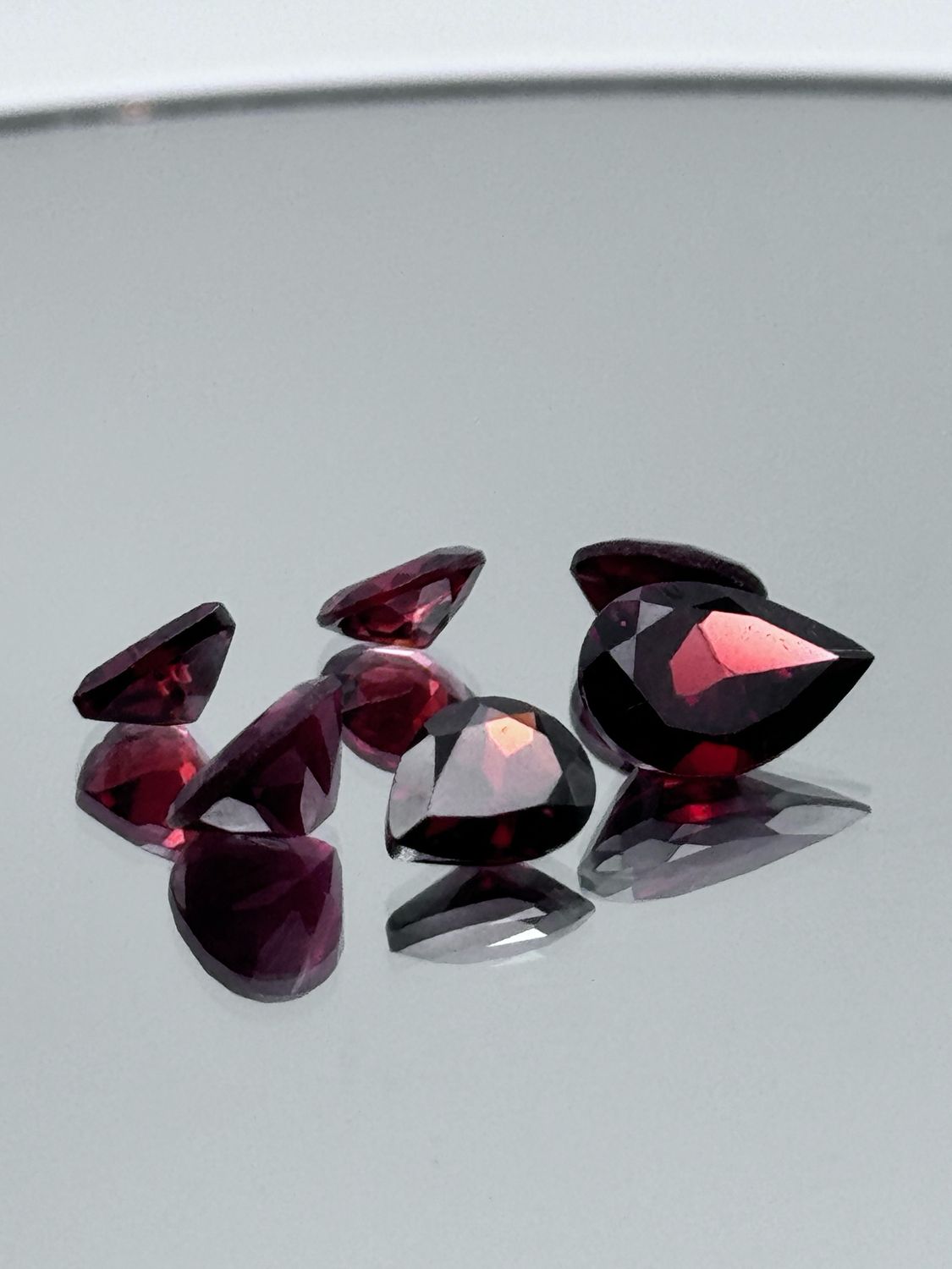 Natural Faceted Garnet Mixed Lot, Minimum 10 Carat Total Weight, Mixed Shapes And Sizes, Minimum 8 Stones Per Parcel, Stones Clean To Slightly Included. No Two Parcels Are Exactly The Same