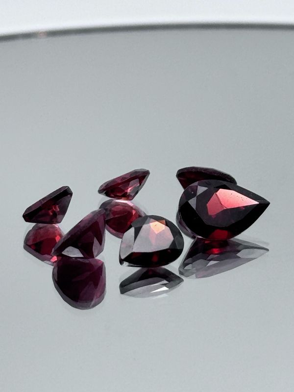 Natural Faceted Garnet Mixed Lot, Minimum 10 Carat Total Weight, Mixed Shapes And Sizes, Minimum 8 Stones Per Parcel, Stones Clean To Slightly Included. No Two Parcels Are Exactly The Same