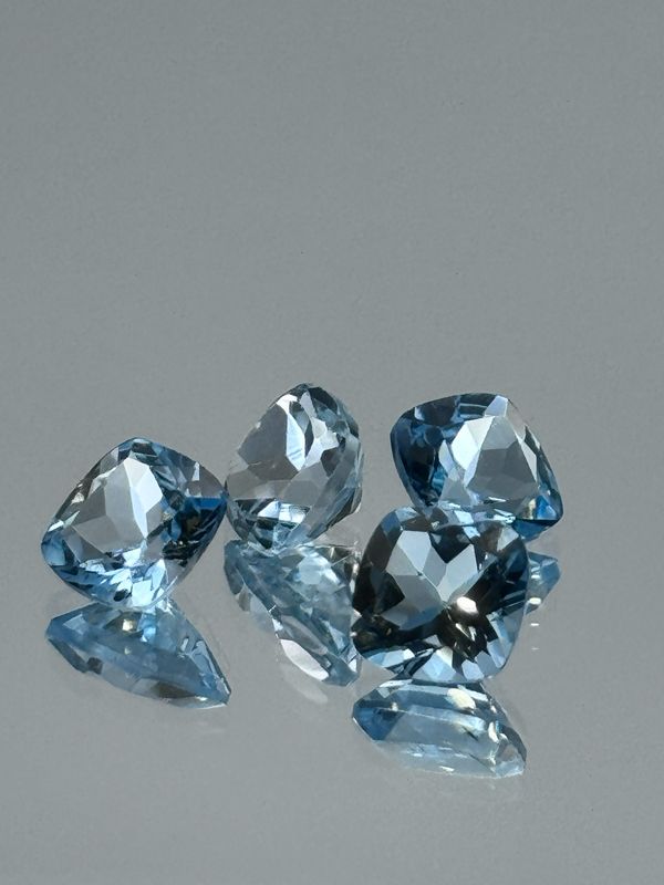 Blue Topaz 4 carat minimum total weight (ctw) 4 Stones