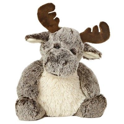 A cute cuddly moose in a sitting position with soft brown fur.