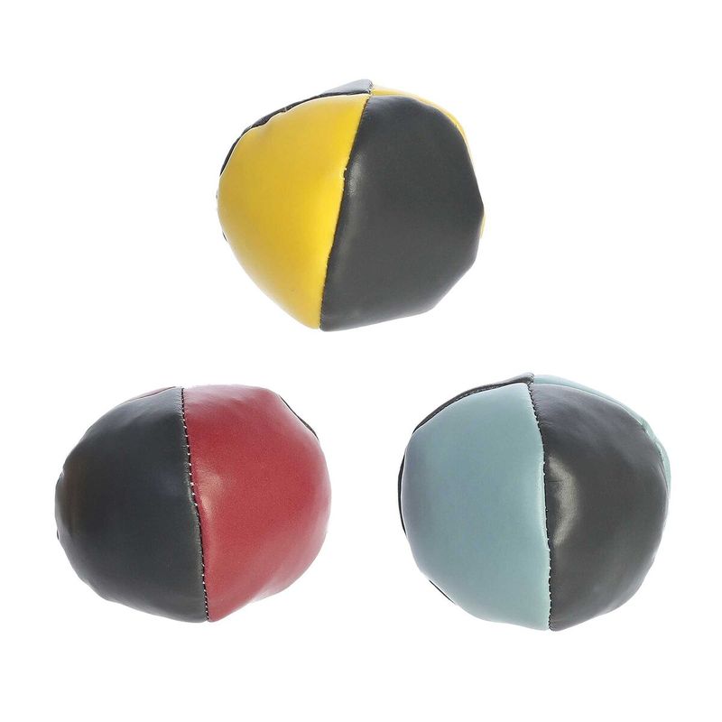 Three classic style juggling balls in blue, red and yellow.
