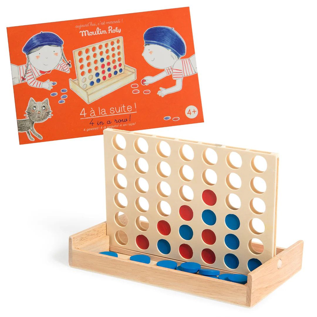 A wooden connect four game with the red game box included in the background.