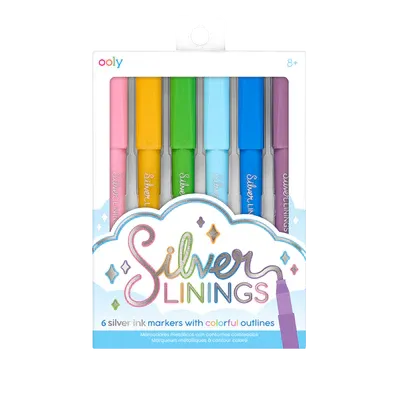 A colorful packaging displaying six silver ink markers with vibrant outlines, titled &quot;Silver Linings,&quot; designed for creative projects.