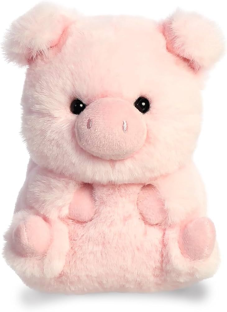 A small round and pink pig plush with cute black button eyes.