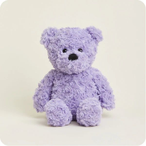 A curly haired purple weighted lavender scented warmie plush.