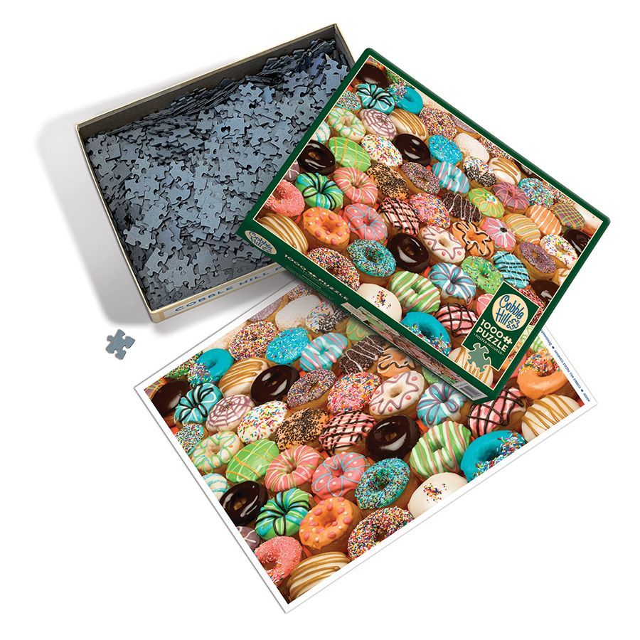 A 1000 piece puzzle of an assorted doughnut collage.