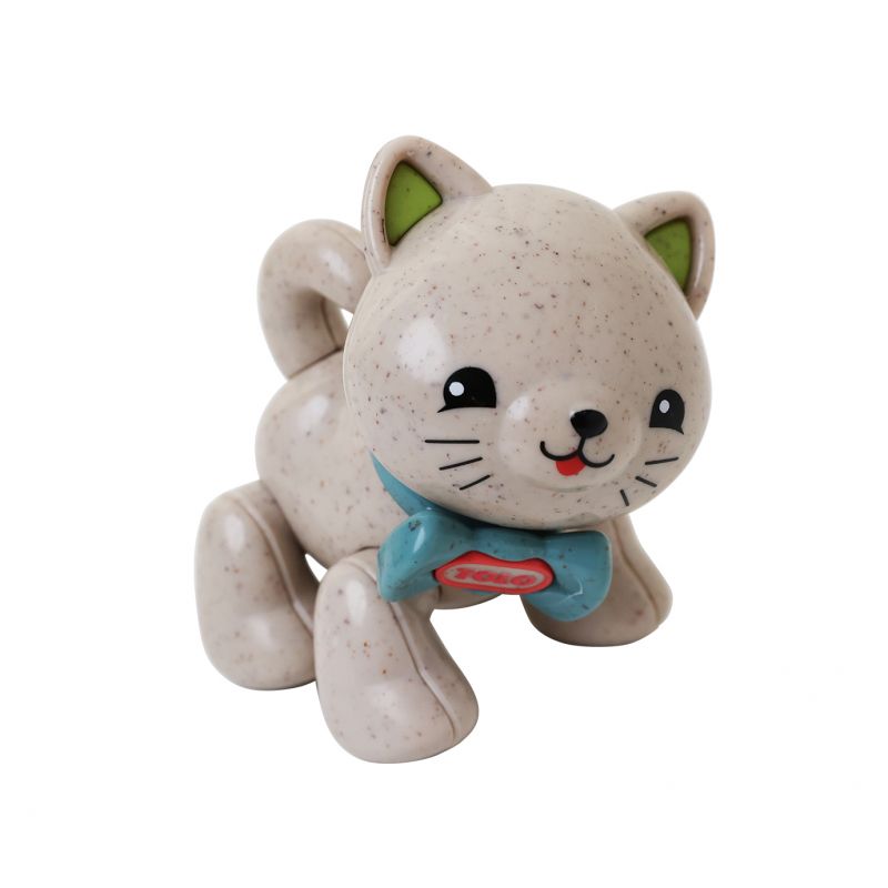 A cute little kitten in a stylish blue bow tie made out of recycled wheat plastic.