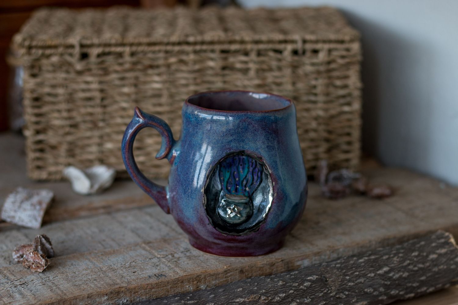 Mug with a cauldron