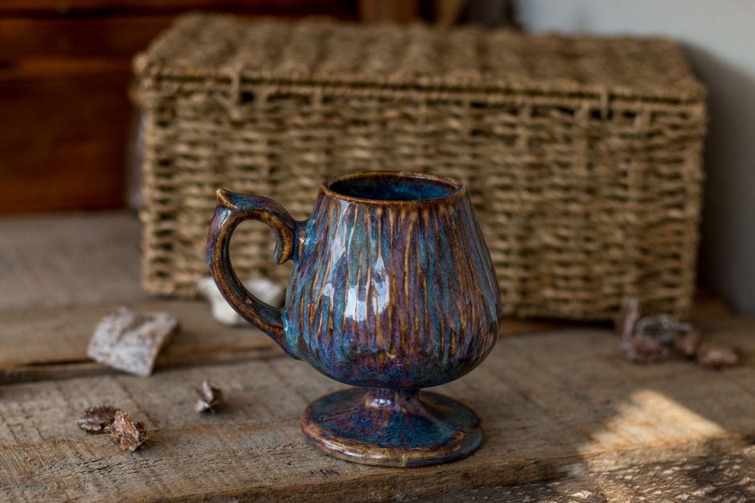 Carved footed mug
