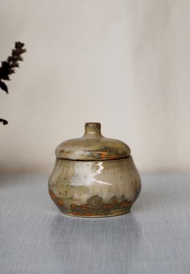 Small golden mushroom canister