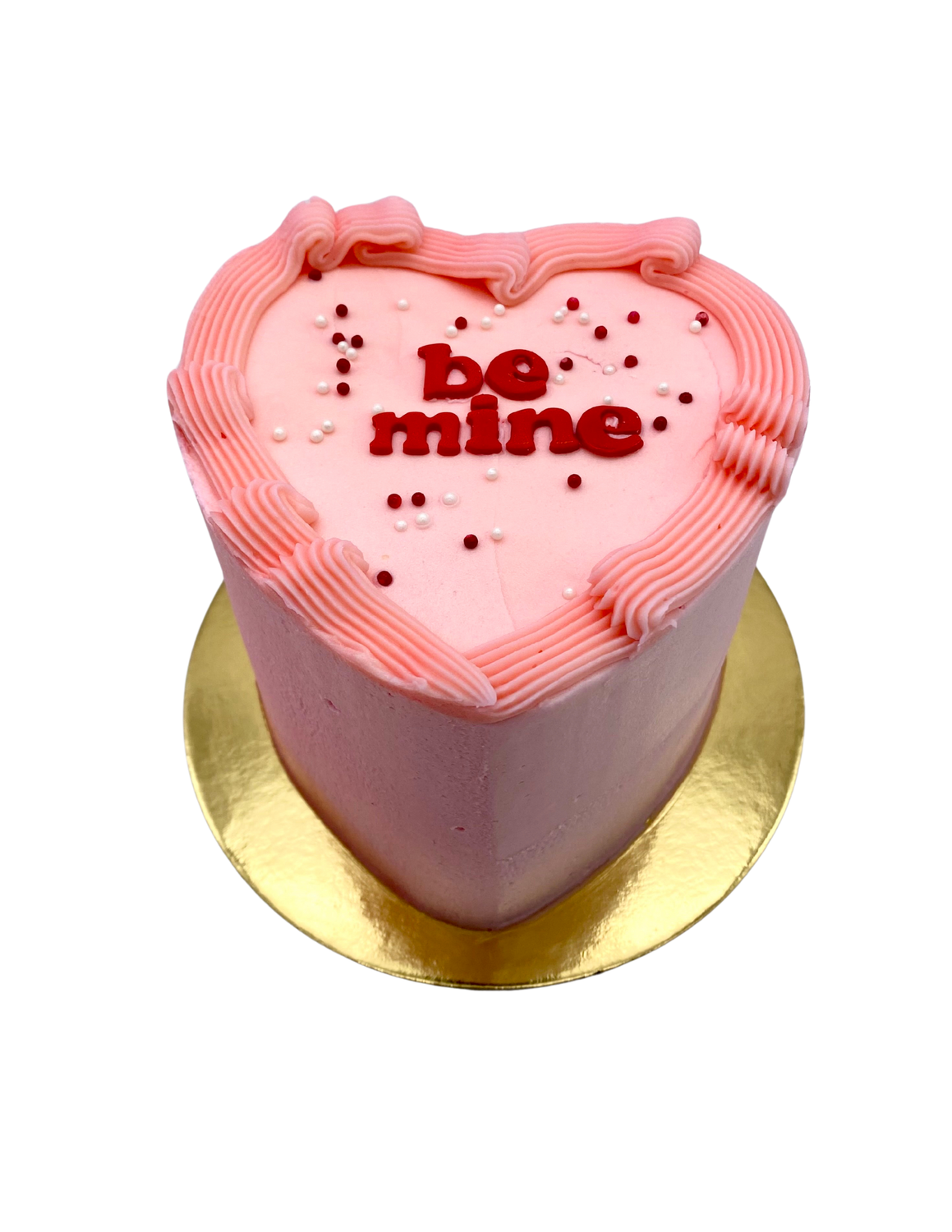 'be mine' heart shaped cake