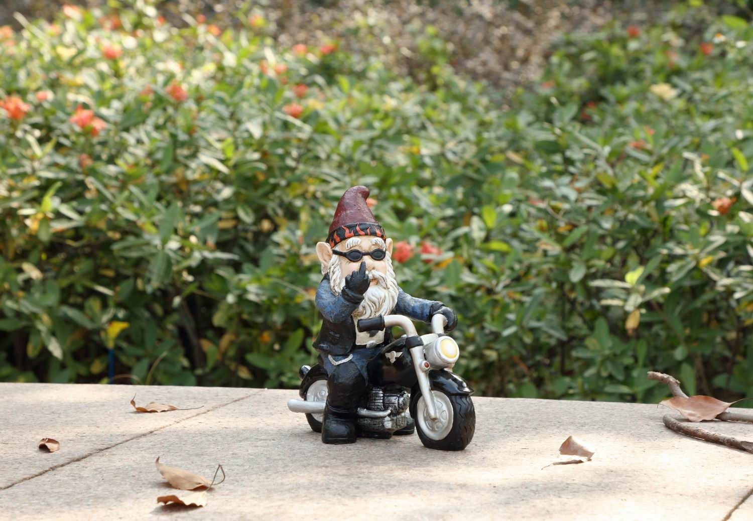 75616-X - GNOME W/MIDDLE FINGER RIDING MOTORCYCLE / 9.25&quot; H