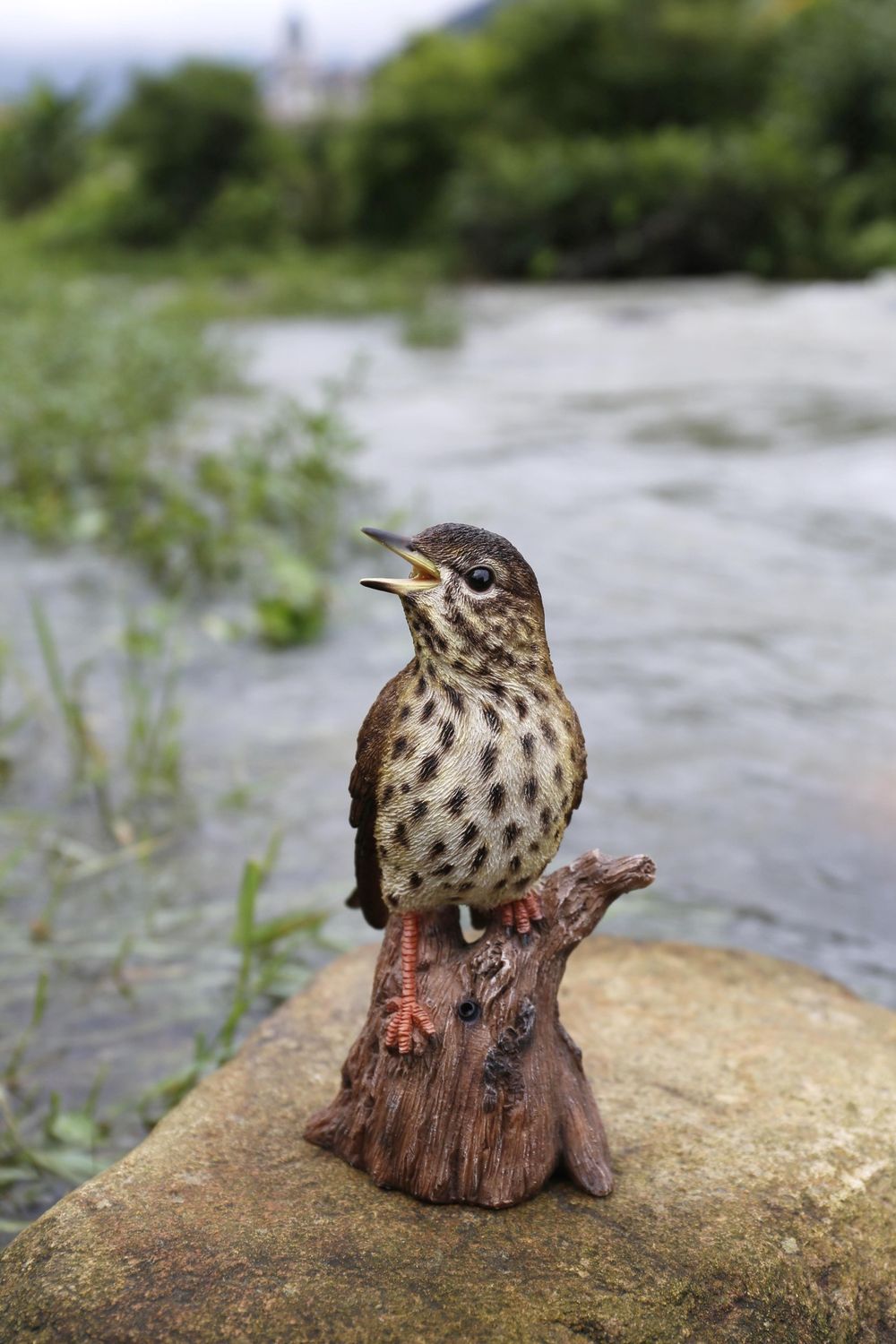 87675-A - MOTION ACTIVATED SINGING SONGBIRD STANDING ON STUMP / 7.68&quot; H