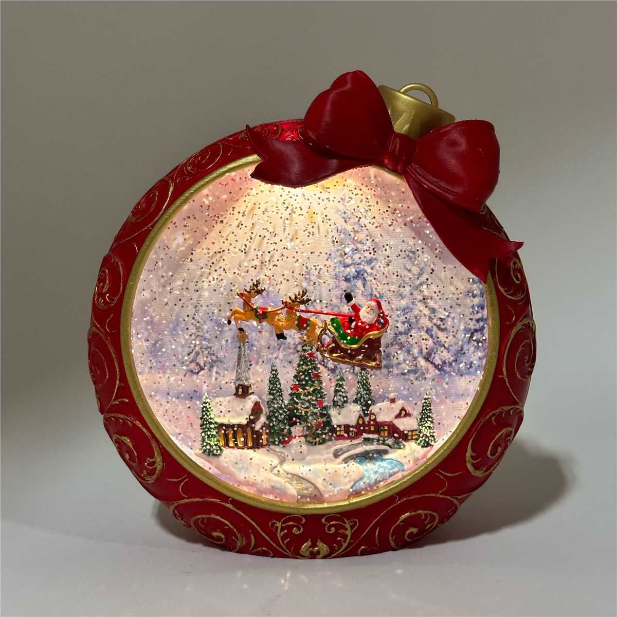 KDA65RD - ILLUMINATING SPINNING WATER BALL / RED SANTA VILLAGE