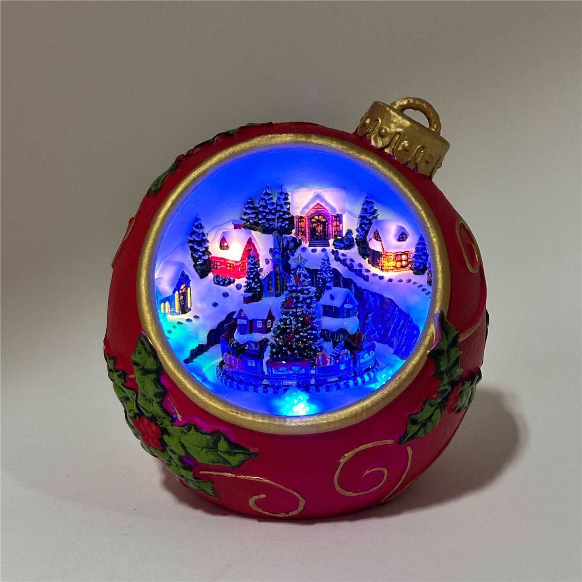 KDA169 - ILLUMINATING MUSICAL ORNAMENT W/ ROTATING TRAIN