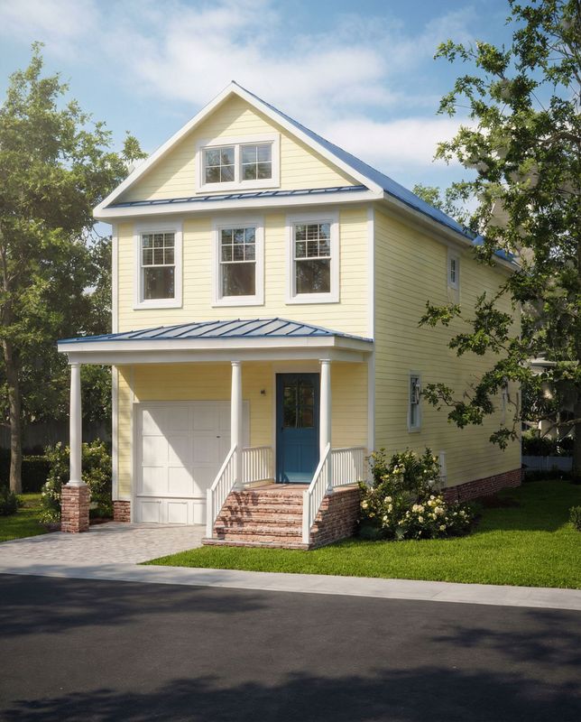Front exterior view of a two-story yellow house with a metal roof, covered porch, and brick entry steps.