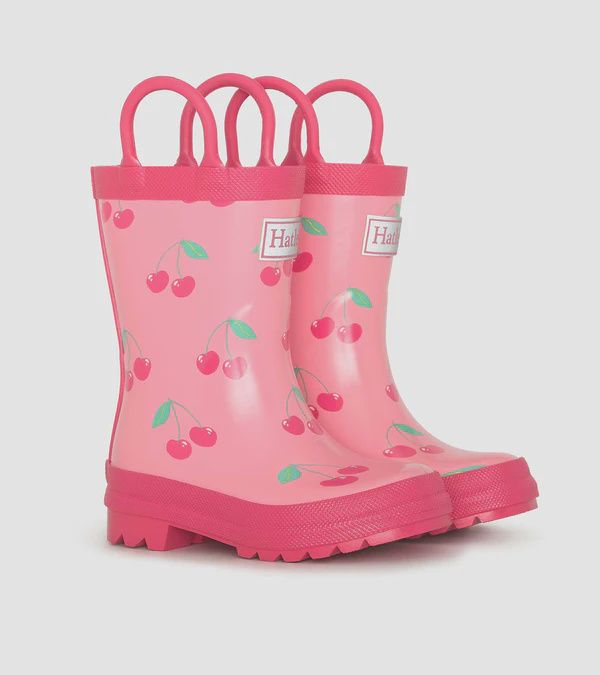 bottes a l'eau rose avec poignées et motifs cerises