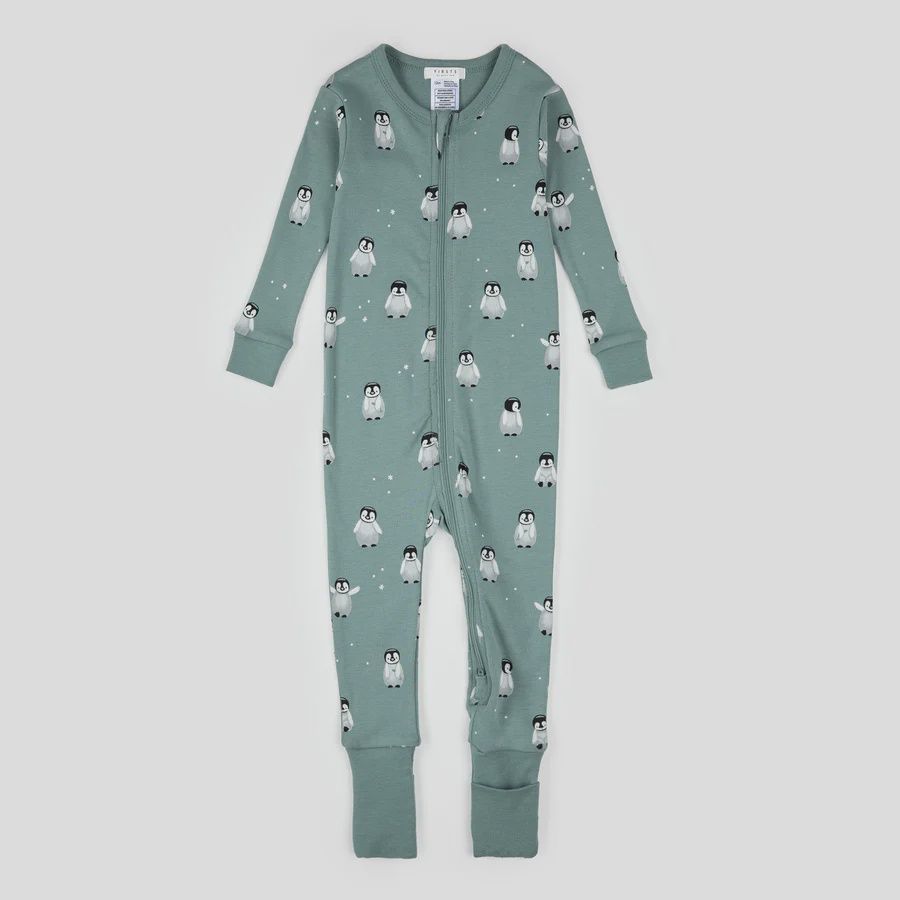 Bébé pingouin imprimé sur lit convertible turquoise